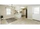 Eat-in kitchen with open design, tile floor, breakfast bar, and plenty of natural light at 732 Westview Ct, Nashville, NC 27856