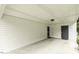 Covered back patio with a door to the backyard, offering a nice outdoor space at 732 Westview Ct, Nashville, NC 27856