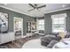 Comfortable living room featuring modern decor and a doorway view into the main bedroom at 760 Bachelor Gulch Way, Apex, NC 27523
