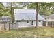Backyard featuring garden beds and privacy fence at 918 Orient St, Durham, NC 27701