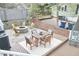 Inviting backyard with string lights, a fire pit, and outdoor seating at 918 Orient St, Durham, NC 27701