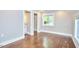 Bedroom with wood floors and large windows at 918 Orient St, Durham, NC 27701