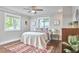 Cozy bedroom with hardwood floors, soft lighting, and a comfortable bed at 918 Orient St, Durham, NC 27701