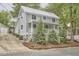 Charming two-story home with a front porch and landscaped yard at 918 Orient St, Durham, NC 27701