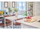 Open concept living and dining area with modern décor, ample natural light, and stylish furnishings at 918 Orient St, Durham, NC 27701