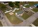 Overhead view of the house, yard, driveway, storage shed, and firepit at 101 Pine St, Dunn, NC 28334