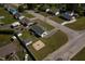 An aerial view showcasing the home, the surrounding yard and neighborhood at 101 Pine St, Dunn, NC 28334