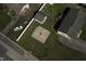 Bird's eye view of house, yard, fire pit and neighboring yards at 101 Pine St, Dunn, NC 28334
