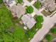 Captivating aerial perspective of a residence boasting a private back deck and lush surroundings at 103 Woodland Ridge Ct, Cary, NC 27519