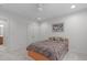 Comfortable bedroom featuring neutral walls, carpet, ceiling fan and a bed with stylish bedding and a serene atmosphere at 103 Woodland Ridge Ct, Cary, NC 27519