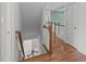 A split staircase going to both the upstairs and the downstairs of the home at 103 Woodland Ridge Ct, Cary, NC 27519