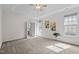 Bright main bedroom with large windows, ceiling fan and ensuite bathroom at 107 Weslyn Trace Dr, Durham, NC 27703