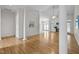 Spacious living room with hardwood floors, ceiling fan, and views to other rooms at 107 Weslyn Trace Dr, Durham, NC 27703