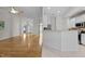 Spacious open floorplan with kitchen, breakfast bar, and hardwood floors at 107 Weslyn Trace Dr, Durham, NC 27703