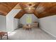 Charming bonus room with wood ceiling, gray walls and carpeted floors, creating a cozy and inviting space at 107 Whitby Ct, Cary, NC 27511