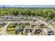 Expansive aerial view of a residential neighborhood surrounded by lush greenery at 108 Sunburst Dr, Durham, NC 27705