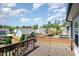 Spacious back deck with wooden railings overlooking the backyard, perfect for outdoor entertaining at 108 Sunburst Dr, Durham, NC 27705