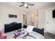 Bright bedroom featuring a cozy bed with superhero-themed bedding, complementing decor and ample natural light at 108 Sunburst Dr, Durham, NC 27705