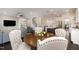 Open floor plan with dining area, kitchen, and living room at 108 Sunburst Dr, Durham, NC 27705