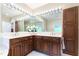 Bright bathroom featuring a double vanity, marble countertops, and Hollywood-style lighting at 11 Pine Forest Dr, Siler City, NC 27344