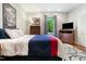 Relaxing bedroom featuring a queen-size bed, warm lighting, and ample storage at 11 Pine Forest Dr, Siler City, NC 27344