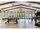 Large game room showcasing a pool table, foosball, and a treadmill, perfect for entertaining guests at 11 Pine Forest Dr, Siler City, NC 27344
