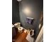 Small half bathroom with gray walls, tile floors, and a modern single-sink vanity at 1211 Odyssey Dr, Durham, NC 27713