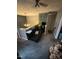 Cozy bedroom featuring unique wall decor and ambient lighting at 1211 Odyssey Dr, Durham, NC 27713