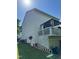 Side view of the house featuring a deck at 1211 Odyssey Dr, Durham, NC 27713