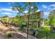 View of the backyard featuring a covered patio, deck, and fenced yard at 1230 Wingstem Pl, Raleigh, NC 27607