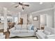 Open-concept living area showcasing hardwood floors, fireplace, and seamless flow to the kitchen at 1230 Wingstem Pl, Raleigh, NC 27607