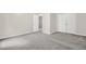 Spacious bedroom with neutral colors, carpet, and an interior entranceway at 1305 Montreux Ct, Mebane, NC 27302