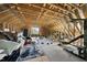 Large unfinished attic with exposed beams and an open layout, awaiting customization at 140 Barletta Ct, Clayton, NC 27527