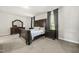 Bedroom with carpet, dark wood furniture set, and natural light at 140 Barletta Ct, Clayton, NC 27527