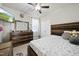 Well-lit bedroom features a spacious closet, stylish dresser, and a cozy bed with ample lighting at 140 Barletta Ct, Clayton, NC 27527