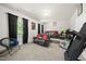 Relaxing bonus room offers comfortable seating and entertainment space for gatherings at 140 Barletta Ct, Clayton, NC 27527