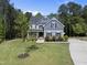 Gorgeous home boasting a well-maintained lawn, mature trees, and a long driveway at 140 Barletta Ct, Clayton, NC 27527
