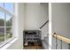 Hallway entrance with shoe rack, lots of natural light and easy access to upstairs at 140 Barletta Ct, Clayton, NC 27527
