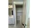 Bathroom features a custom closet with shelving for plenty of storage at 1403 Cottondale Lane, Wake Forest, NC 27587