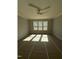 Spacious bedroom featuring carpeted floors, neutral paint and triple windows providing plenty of light at 1403 Cottondale Lane, Wake Forest, NC 27587