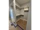 Bedroom closet features a sliding mirror door and custom shelves and hanging storage at 1403 Cottondale Lane, Wake Forest, NC 27587
