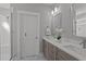 Modern bathroom featuring double sinks, granite countertops, and glass enclosed shower at 145 Leisure Ln # 12, Louisburg, NC 27549