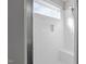 Spacious shower with subway tile surround, niche, and window for natural light at 145 Leisure Ln # 12, Louisburg, NC 27549
