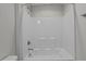 Clean bathroom features tub/shower combo, new fixtures, and neutral paint at 145 Leisure Ln # 12, Louisburg, NC 27549