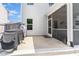 Spacious backyard patio with grill, furniture, and access to screened-in porch at 150 Sherrill Place Ln, Garner, NC 27529