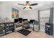 Home office with multiple monitors, a comfortable chair, and ample storage at 150 Sherrill Place Ln, Garner, NC 27529
