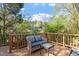 Spacious wooden deck with seating to enjoy the outdoors at 1601 Dunraven Dr, Raleigh, NC 27612