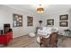 Inviting living room with ample seating, stylish decor, and wood-look floors at 1601 Dunraven Dr, Raleigh, NC 27612