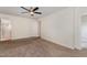 Bedroom featuring a closet, ensuite bathroom, carpet, and neutral walls at 2024 Spring Creek Dr, Durham, NC 27704