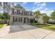 Charming two-story home featuring neutral siding, black shutters, and a well-maintained front yard at 2024 Spring Creek Dr, Durham, NC 27704